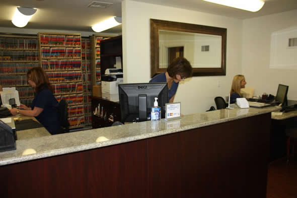 Reception desk with receptionists